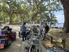 May be an image of 3 people and motorcycle